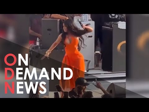 Cardi B THROWS Mic At Fan Who Hurls Drink At Her On Stage